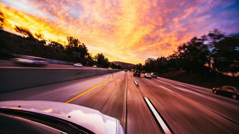 Motorway driving in sunset